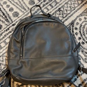 Grey leather backpack